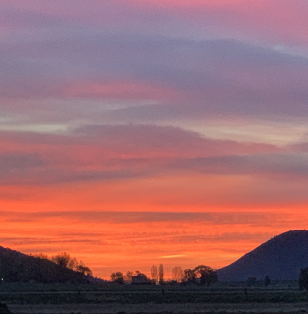 Image shows a colorful sunset.