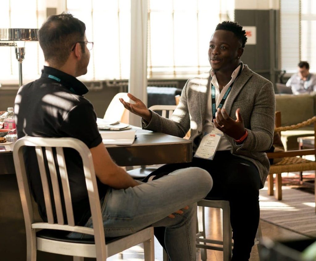 Two men are talking.